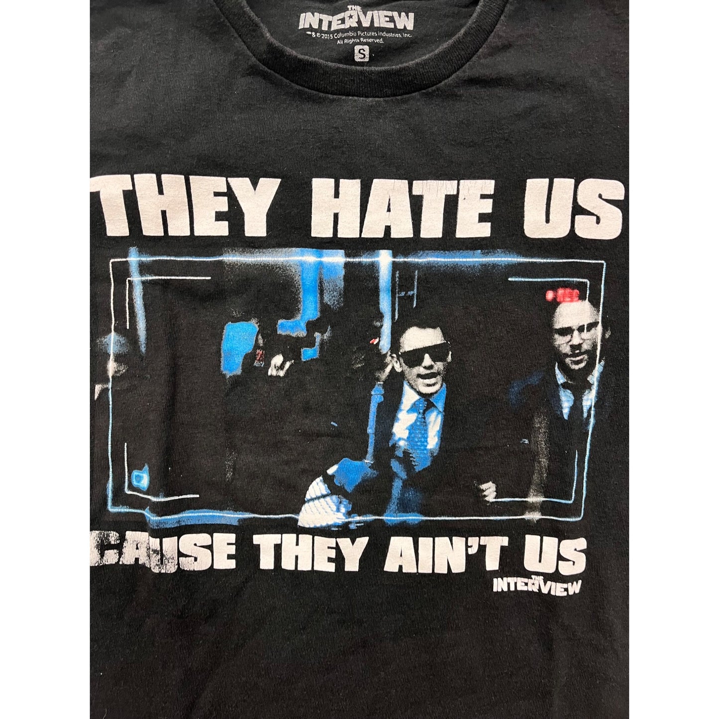 Women’s “The Interview” Graphic T-Shirt Black "They Hate Us Cause They Aint Us" #6308